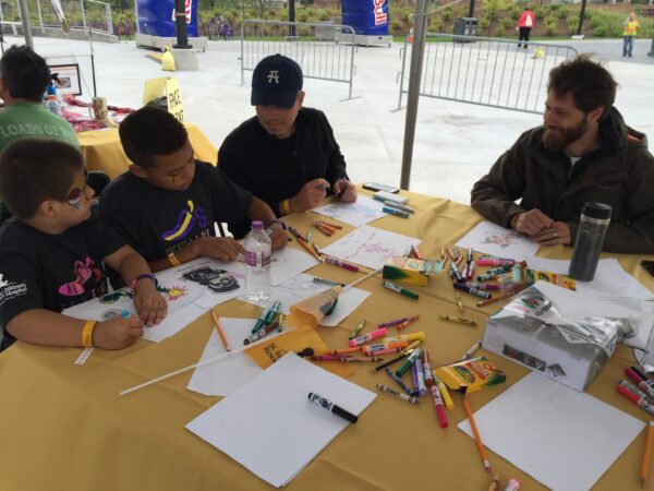 Kelly McNutt and Phil Juliano share cartooning secrets with the next generation.